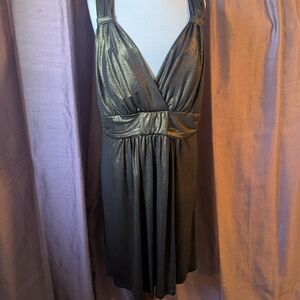 Star Vixen Black and Gold Backless Dress